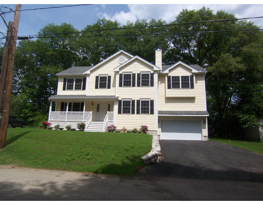 38 Standish Road Arlington, MA 02478 - Photo 1 of 24 a front view of a house with a yard