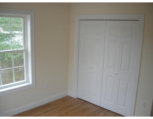 38 Standish Road Arlington, MA 02478 - Photo 12 of 24 a view of an empty room with a window