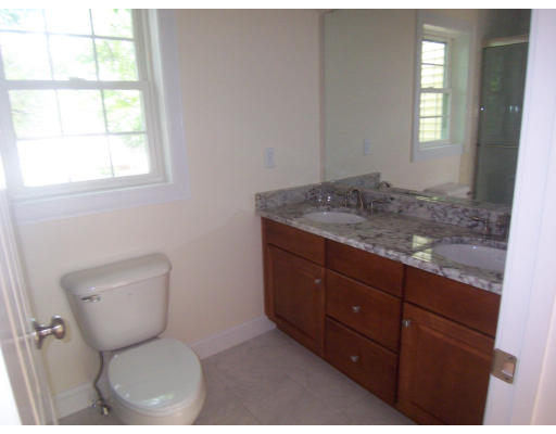 38 Standish Road Arlington, MA 02478 - Photo 15 of 24 a bathroom with a toilet sink and mirror