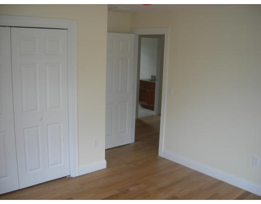 38 Standish Road Arlington, MA 02478 - Photo 18 of 24 a view of a room with a hallway