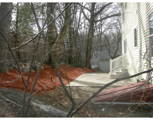 38 Standish Road Arlington, MA 02478 - Photo 19 of 24 a backyard of a house with lots of green space