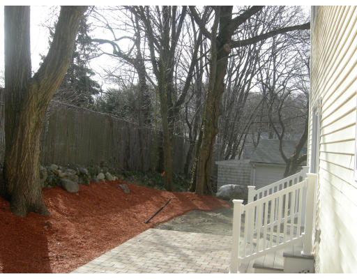 38 Standish Road Arlington, MA 02478 - Photo 20 of 24 a view of a backyard with large trees