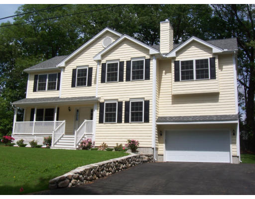 38 Standish Road Arlington, MA 02478 - Photo 24 of 24 a front view of a house with a yard