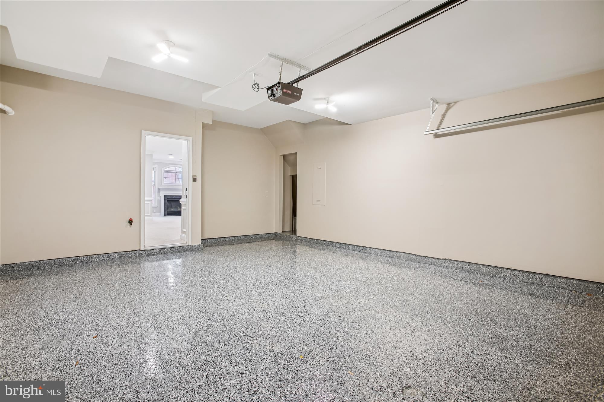 5450 Edsall Ridge Place Alexandria, VA 22312 - Photo 48 of 85 an empty room with a ceiling fan and a ceiling fan