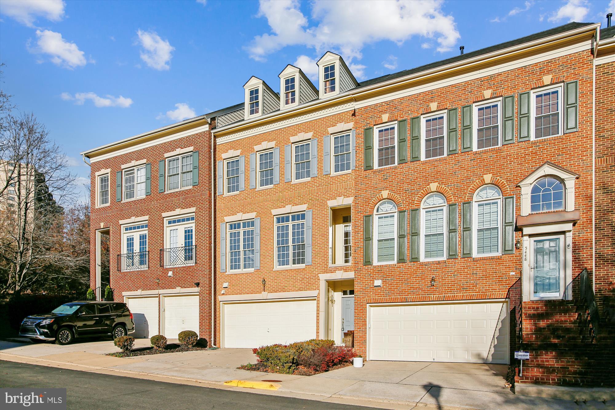 5450 Edsall Ridge Place Alexandria, VA 22312 - Photo 50 of 85 a front view of a building with street view