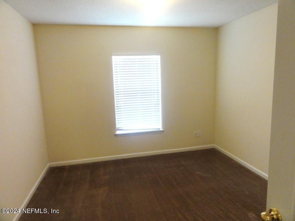 1694 Biscayne Bay Circle Jacksonville, FL 32218 - Photo 15 of 17 an empty room with a window