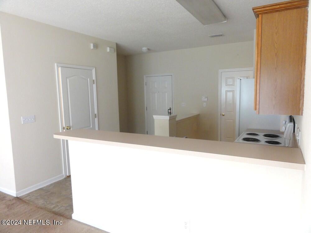 1694 Biscayne Bay Circle Jacksonville, FL 32218 - Photo 4 of 17 a room with a bed and furniture