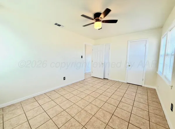 a view of a backyard of the house