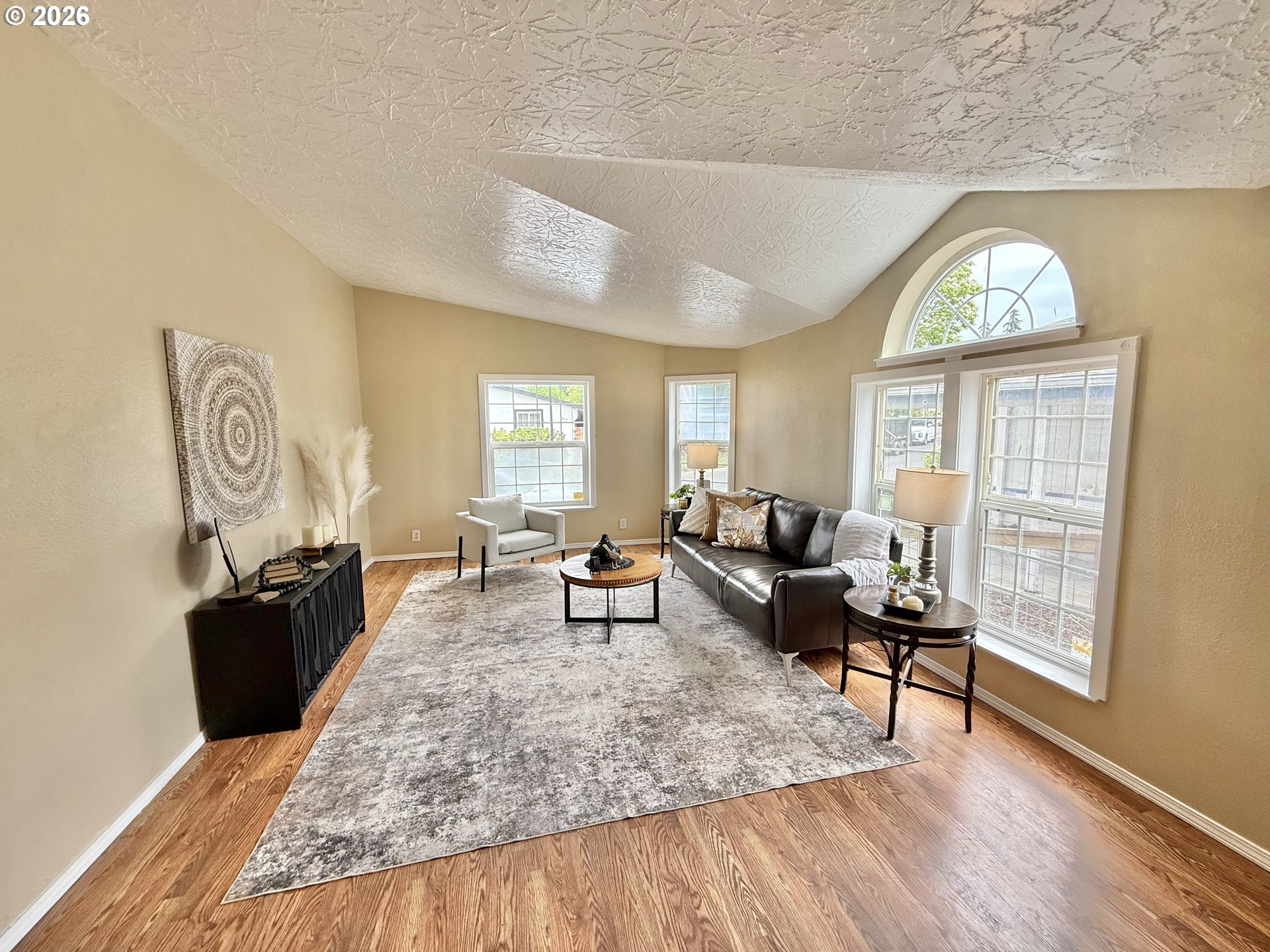 1282 3rd Street, Unit 37 Lafayette, OR 97127 - Photo 3 of 28 a living room with furniture windows and wooden floor