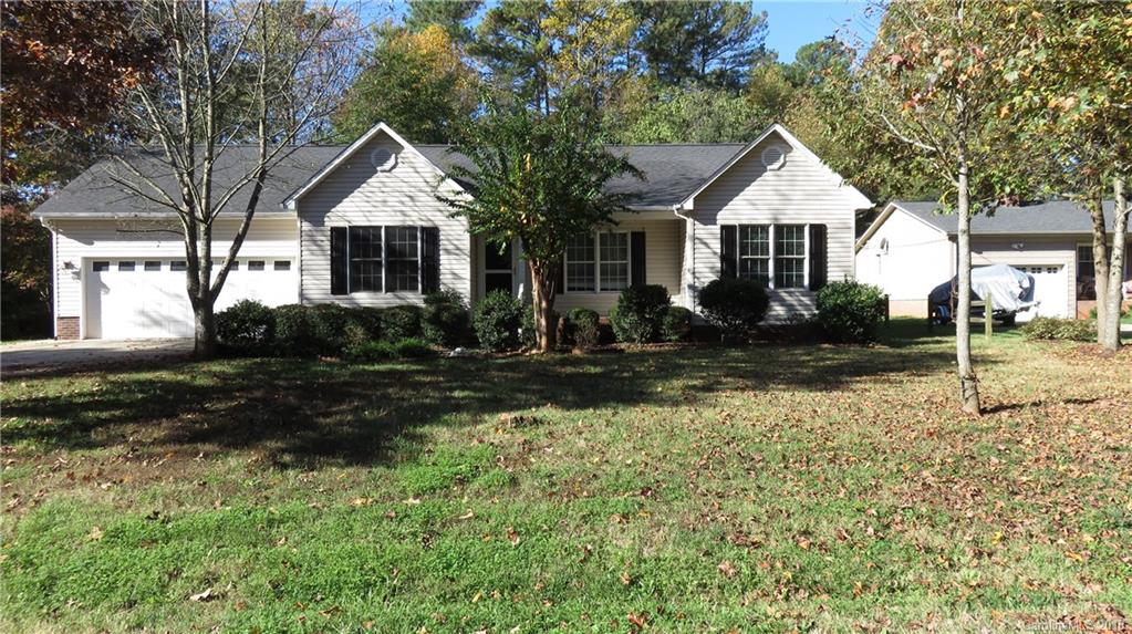 3059 Lake Shore Road South Denver, NC 28037 - Photo 1 of 12 a front view of a house with a yard