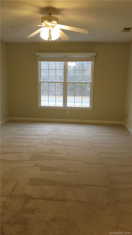 3059 Lake Shore Road South Denver, NC 28037 - Photo 7 of 12 a view of an empty room with a window