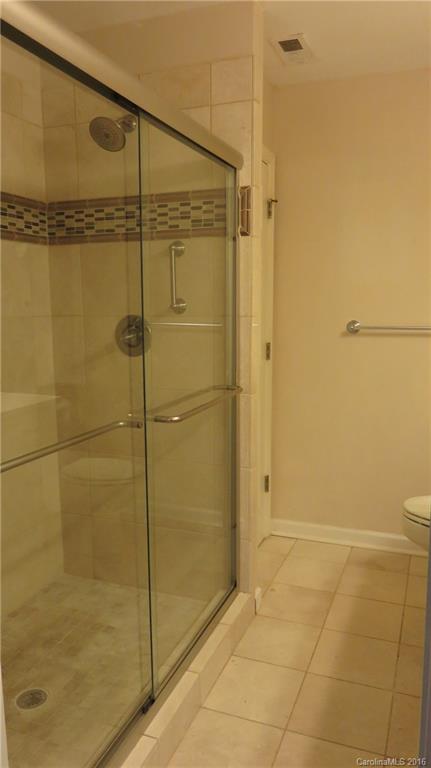 3059 Lake Shore Road South Denver, NC 28037 - Photo 8 of 12 a bathroom with a shower