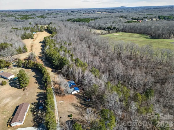 an aerial view of mountain with outdoor space
