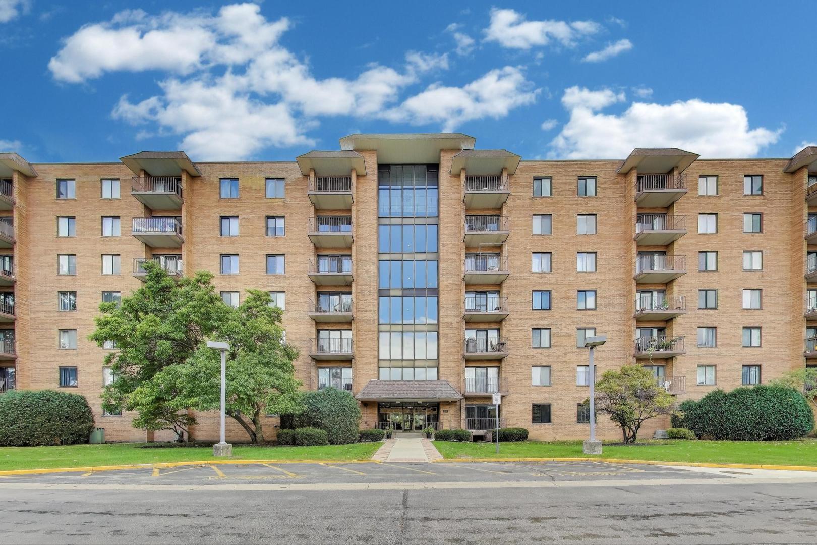 1717 West Crystal Lane, Unit 610 Mount Prospect, IL 60056 - Photo 1 of 23 a front view of a building