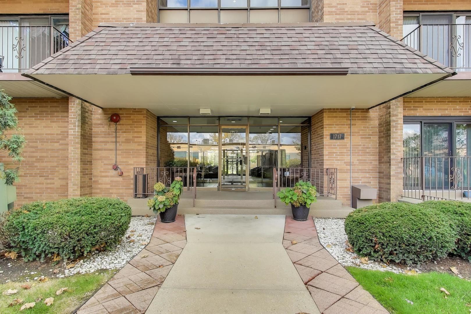 1717 West Crystal Lane, Unit 610 Mount Prospect, IL 60056 - Photo 2 of 23 a view of a pathway with a patio