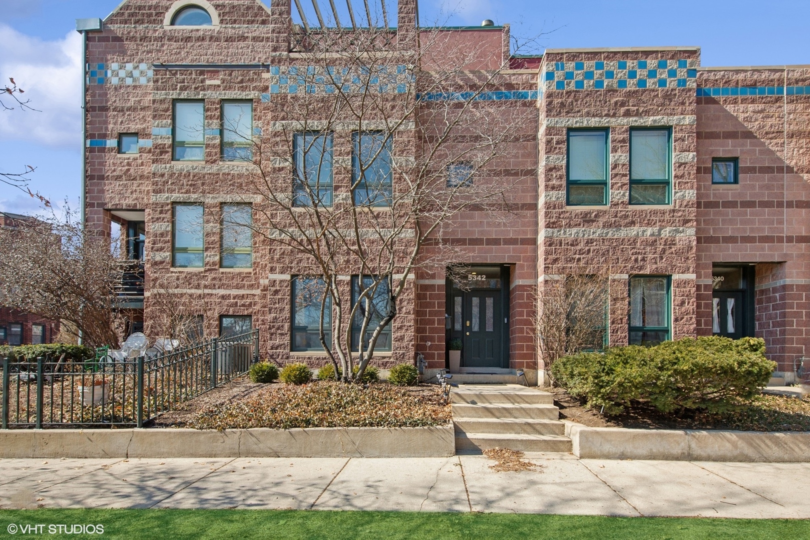 5342 South Ingleside Avenue Chicago, IL 60615 - Photo 1 of 1 a front view of a house with garden