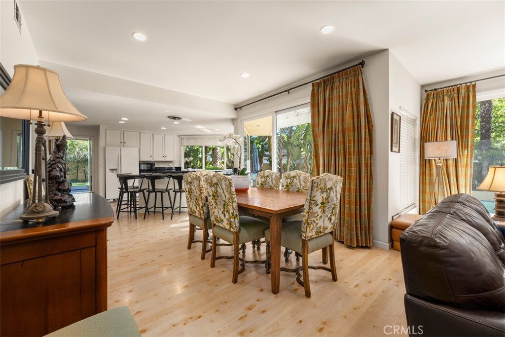 10 Rue Valbonne Newport Beach, CA 92660 - Photo 15 of 66 a view of a a dining room with furniture window and outside view