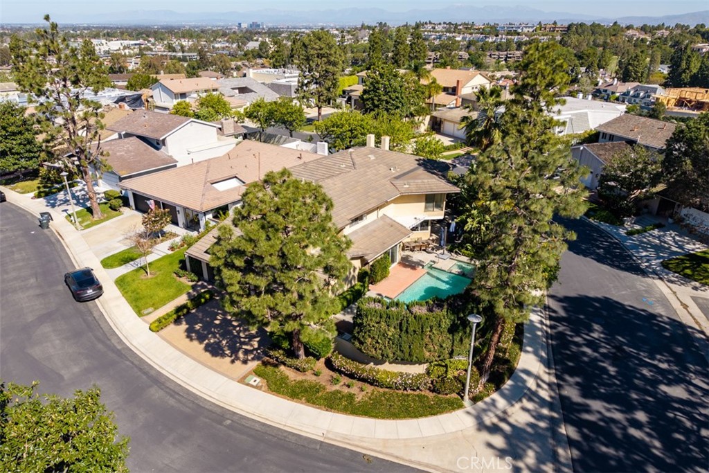 10 Rue Valbonne Newport Beach, CA 92660 - Photo 2 of 66 an aerial view of a house with a garden