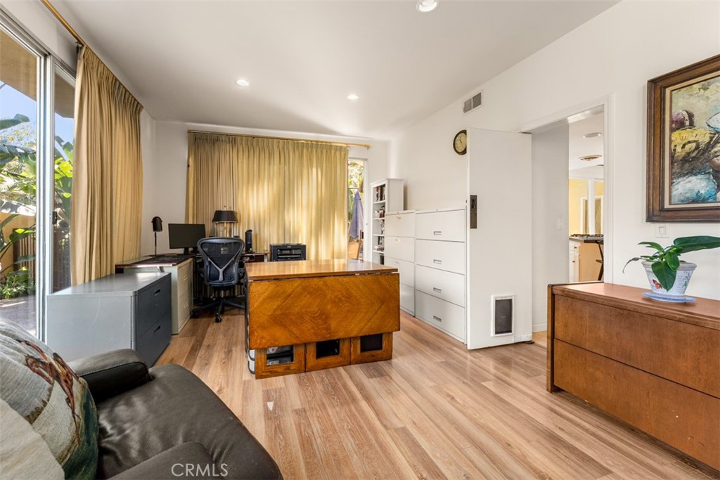 10 Rue Valbonne Newport Beach, CA 92660 - Photo 23 of 66 a living room with furniture and wooden floor