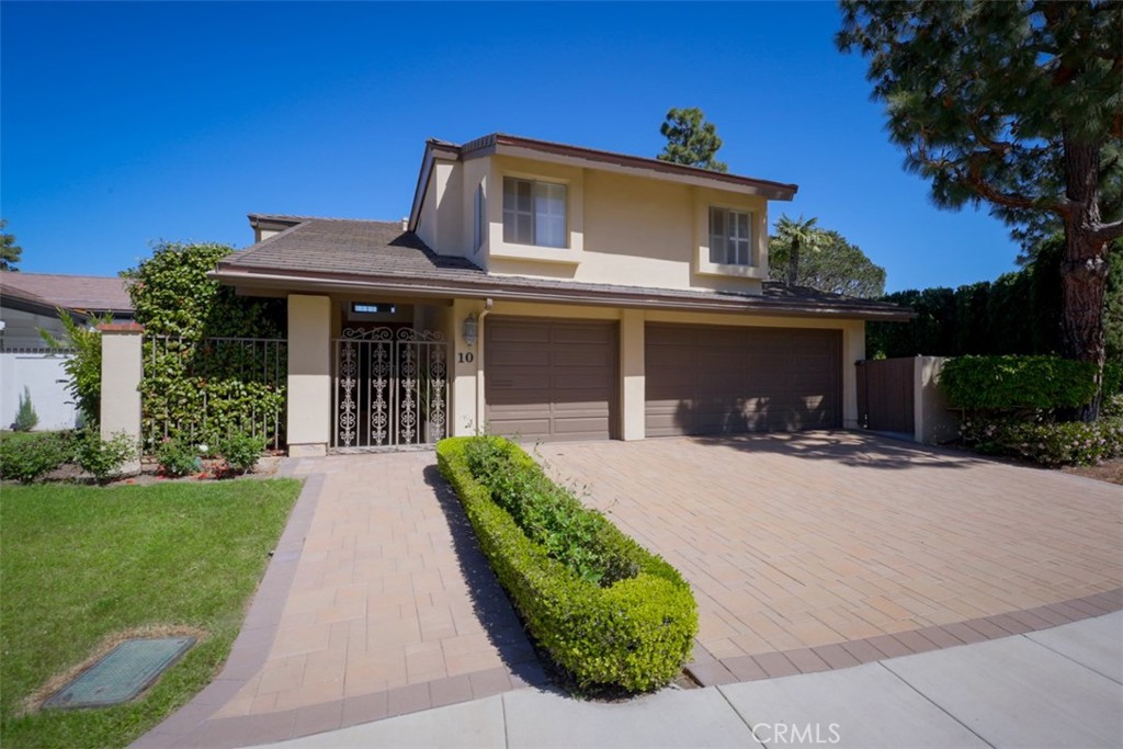 10 Rue Valbonne Newport Beach, CA 92660 - Photo 3 of 66 front view of a house with a yard
