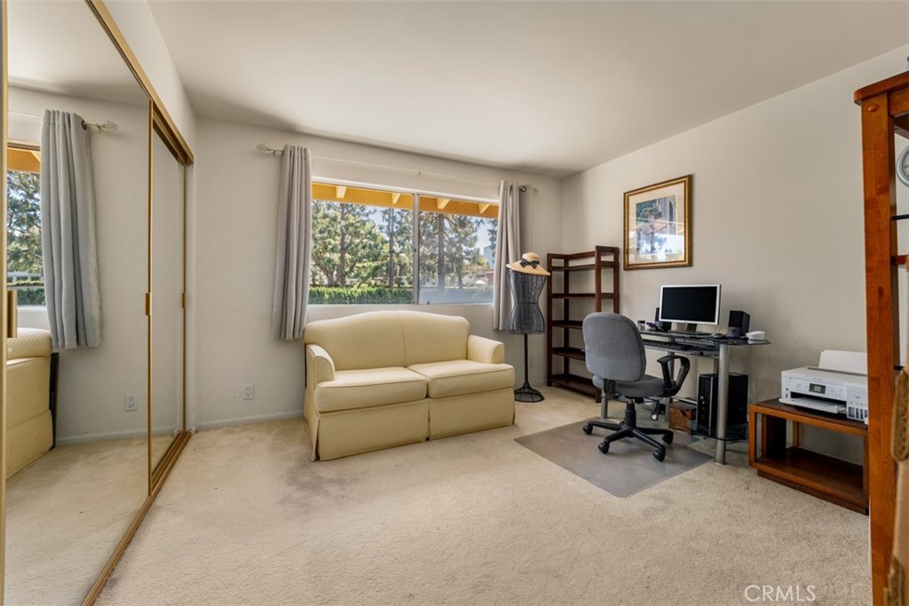 10 Rue Valbonne Newport Beach, CA 92660 - Photo 38 of 66 a view of a livingroom with workspace and a couch