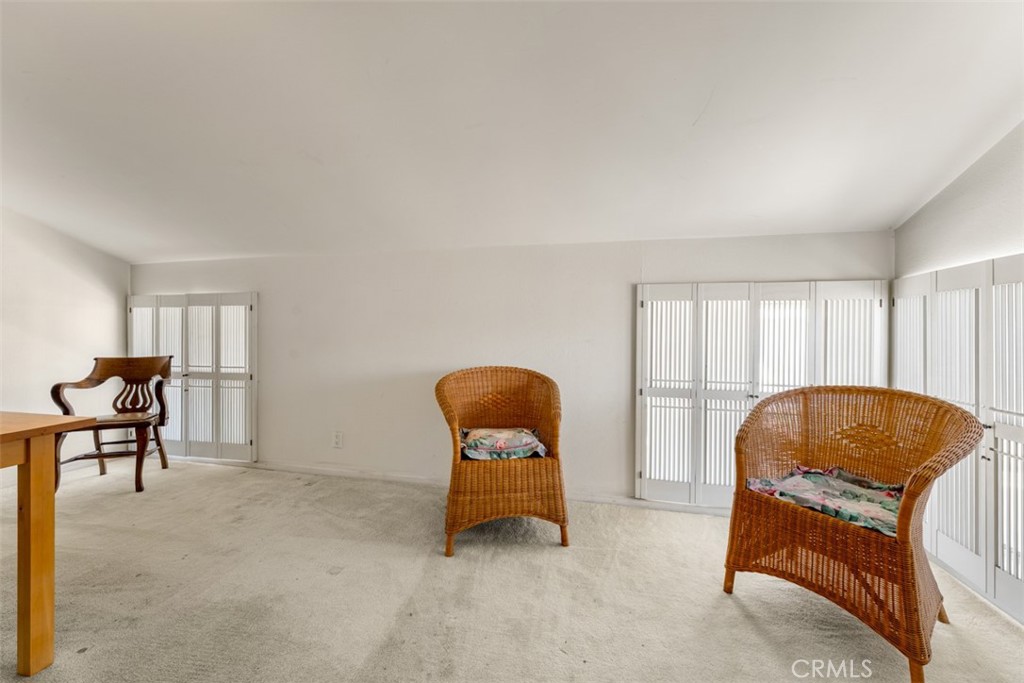 10 Rue Valbonne Newport Beach, CA 92660 - Photo 43 of 66 a living room with furniture and a window