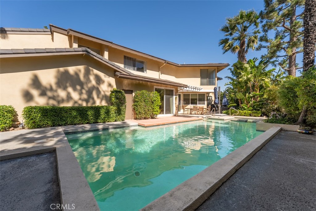 10 Rue Valbonne Newport Beach, CA 92660 - Photo 47 of 66 a view of a swimming pool with a patio