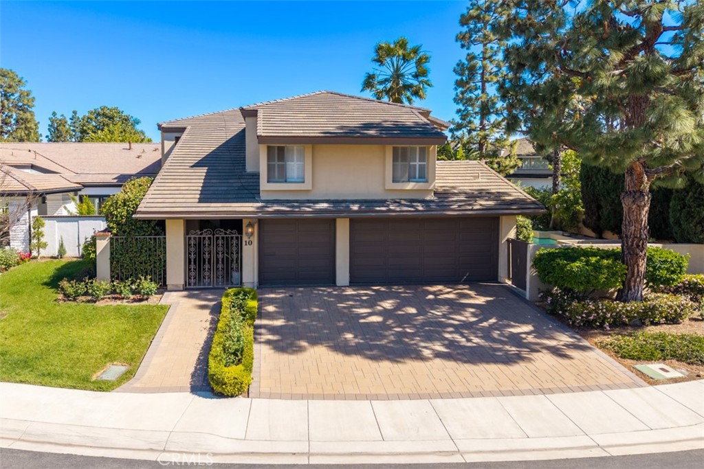 10 Rue Valbonne Newport Beach, CA 92660 - Photo 54 of 66 a front view of a house with porch