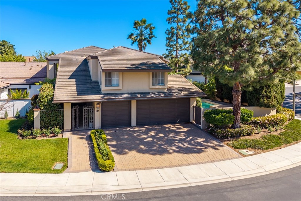 10 Rue Valbonne Newport Beach, CA 92660 - Photo 55 of 66 a view of a house with a yard