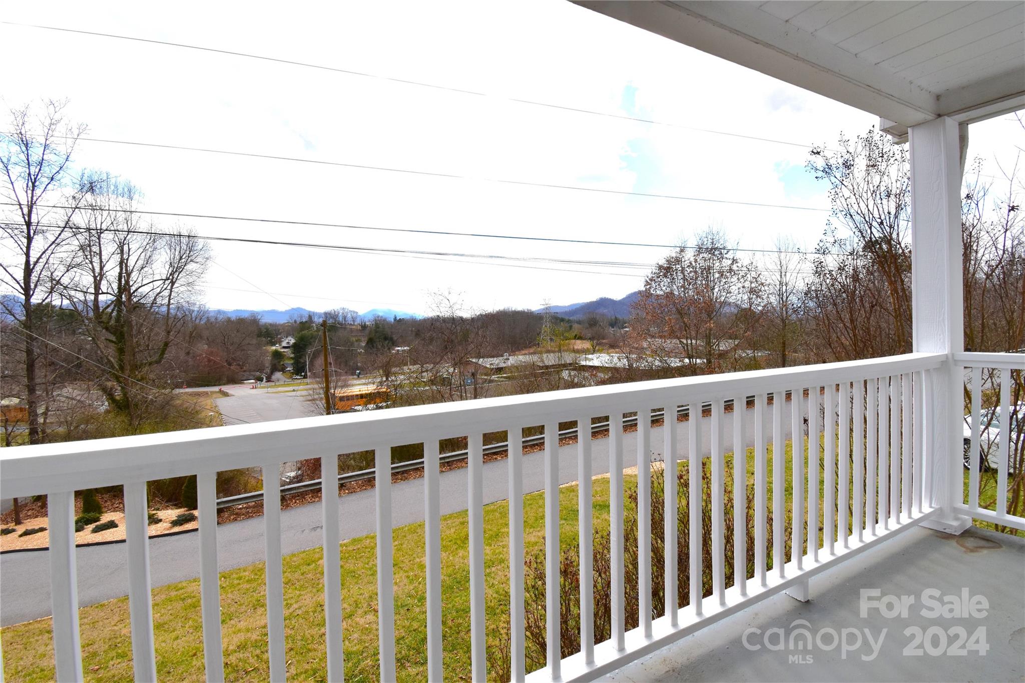 116 Warner Road Canton, NC 28716 - Photo 17 of 22 a view of a building from a roof deck
