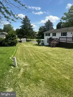 a house view with a garden space