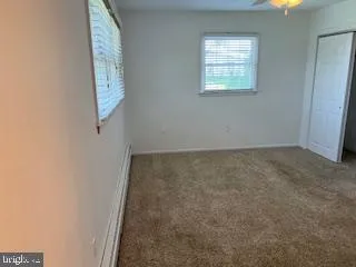 an empty room with a workbench