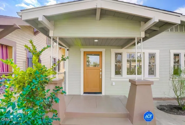 a front view of a house with an outdoor space