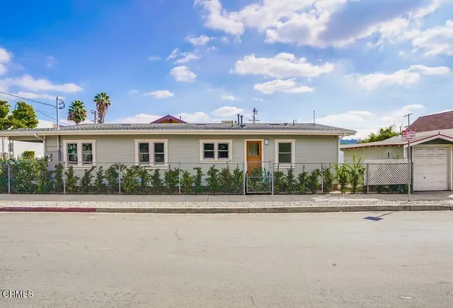 front view of house with a small yard
