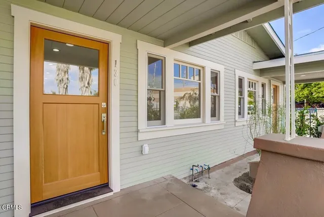 a bathroom with a tub and a window