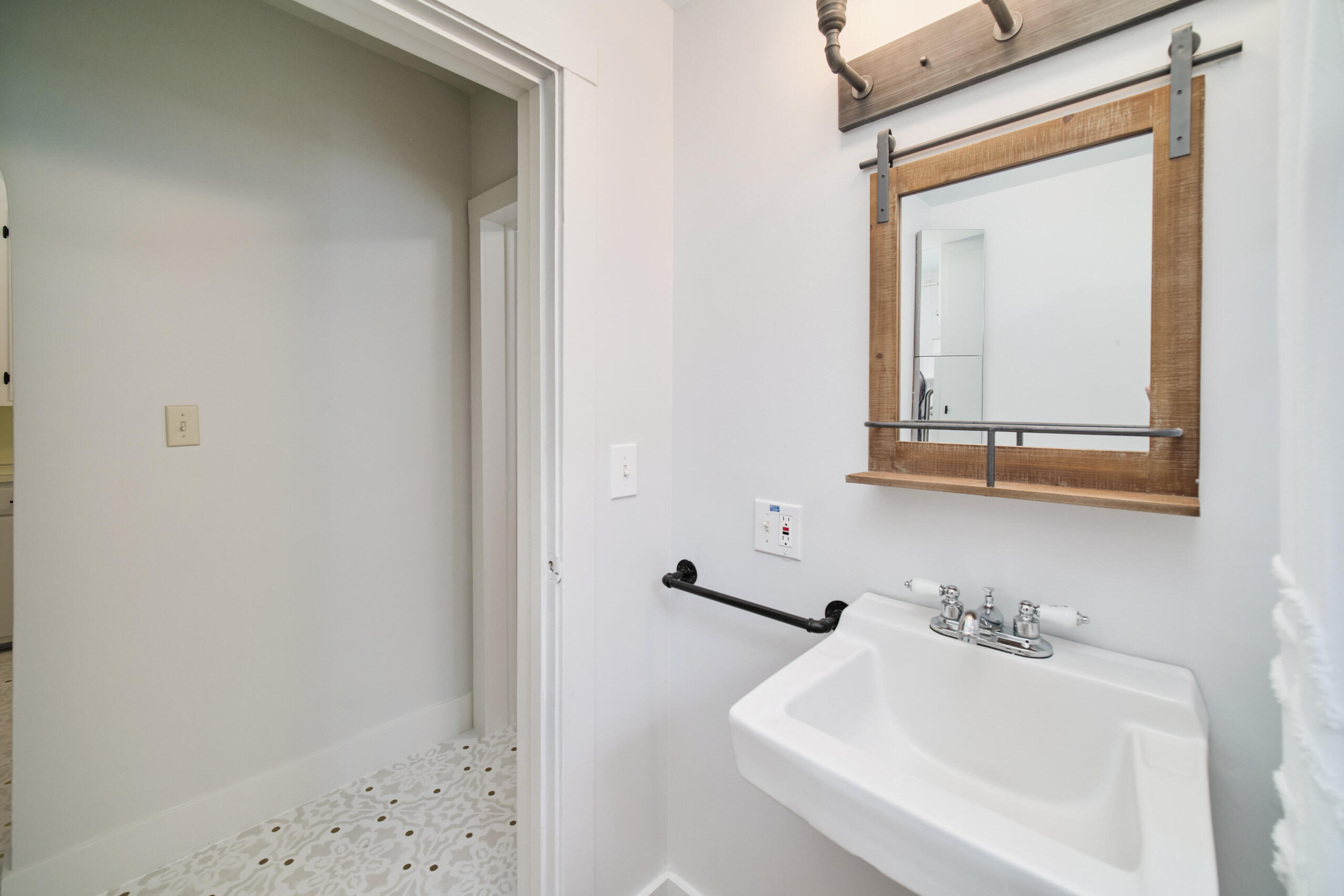 244 5th Street Manistee, MI 49660 - Photo 20 of 45 New light fixture and mirror