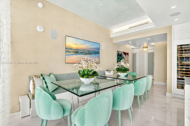 a kitchen with stainless steel appliances kitchen island granite countertop a sink and cabinets