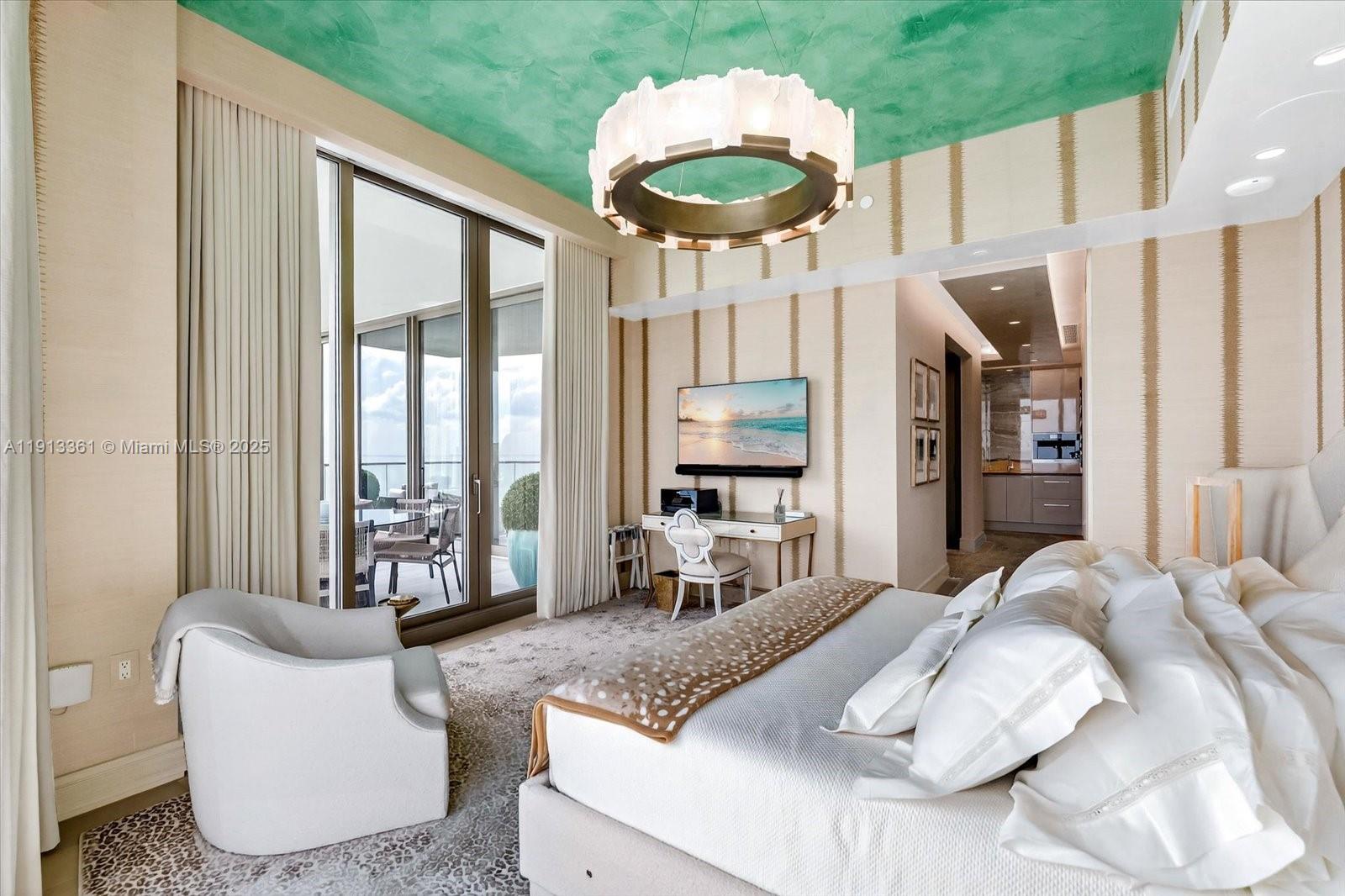 17901 Collins Avenue, Unit 2004 Sunny Isles Beach, FL 33160 - Photo 31 of 55 a bedroom with furniture and a large window