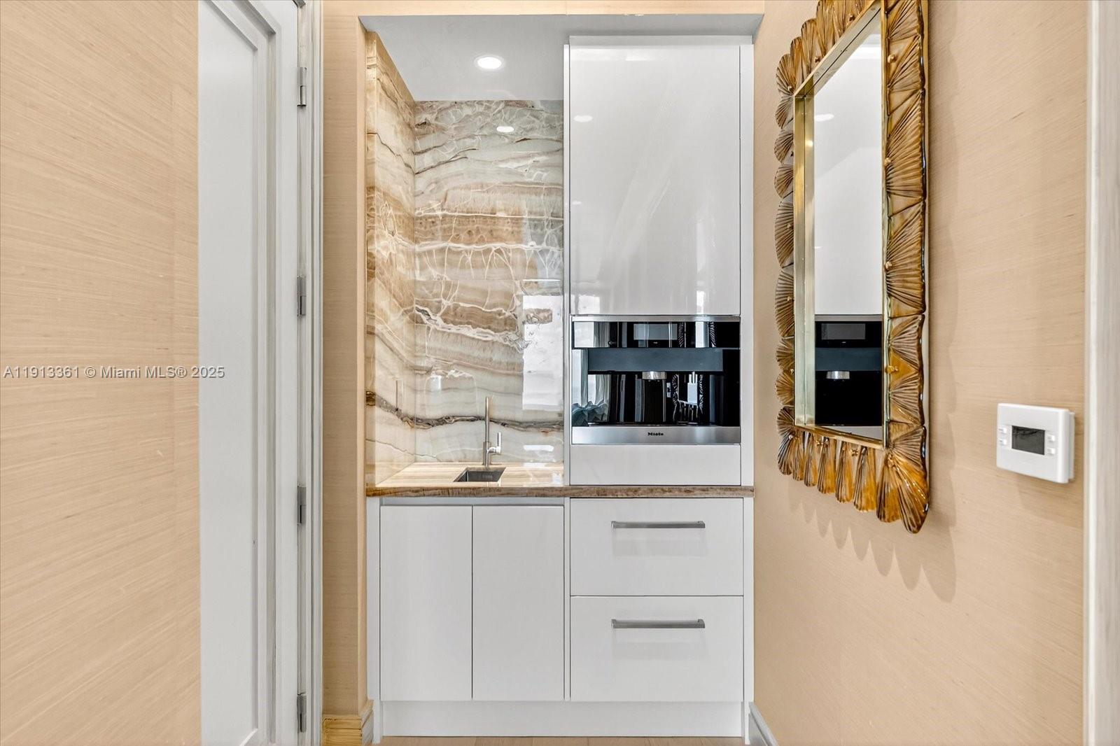 17901 Collins Avenue, Unit 2004 Sunny Isles Beach, FL 33160 - Photo 33 of 55 a bathroom with a shower and a mirror