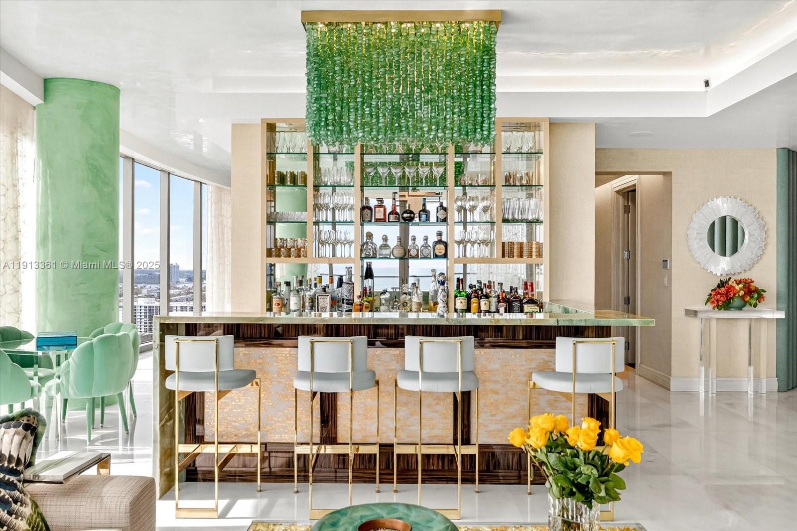 17901 Collins Avenue, Unit 2004 Sunny Isles Beach, FL 33160 - Photo 8 of 55 a living room filled with furniture and a table