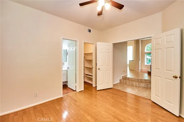 a bathroom with a sink toilet a mirror and shower