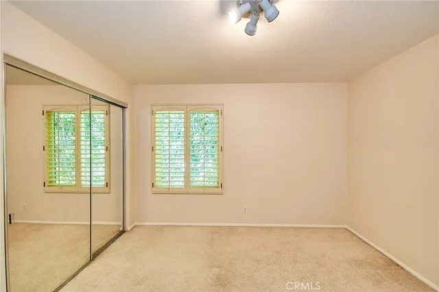 a bathroom with a sink double vanity and a mirror