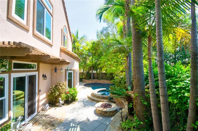 a view of a swimming pool with a lounge chairs