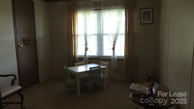 a room with furniture and a window