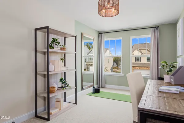 a living room with furniture and a table