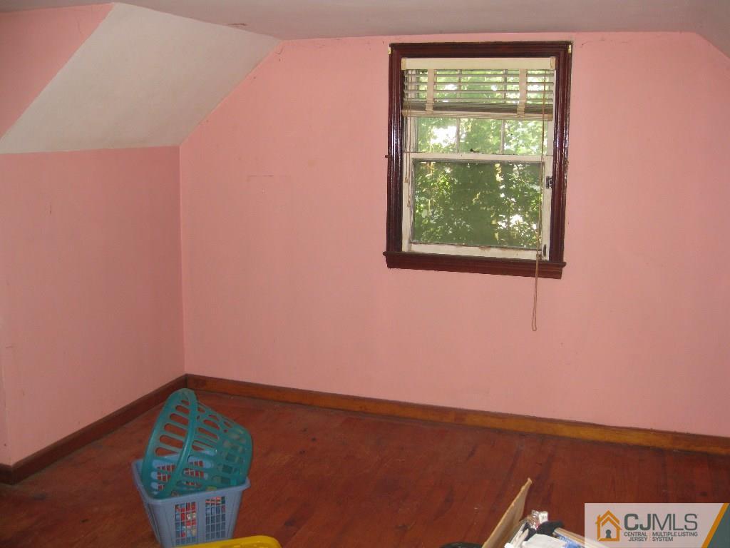188 Texas Road Old Bridge, NJ 08857 - Photo 6 of 7 an empty room with a window