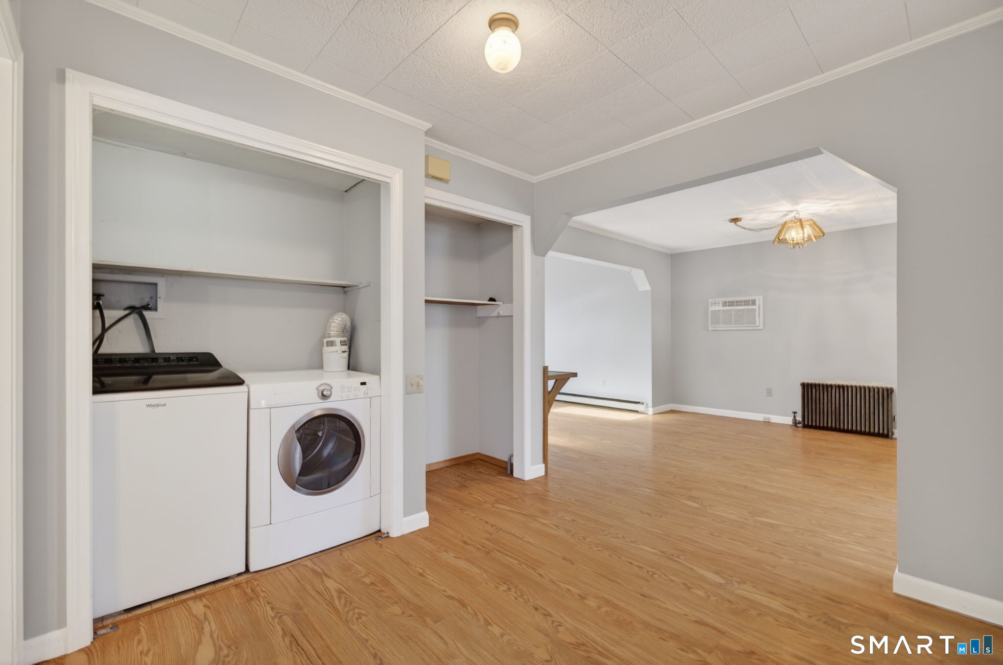 19 High Street Groton, CT 06340 - Photo 20 of 38 a view of a storage & utility room with a washer and dryer