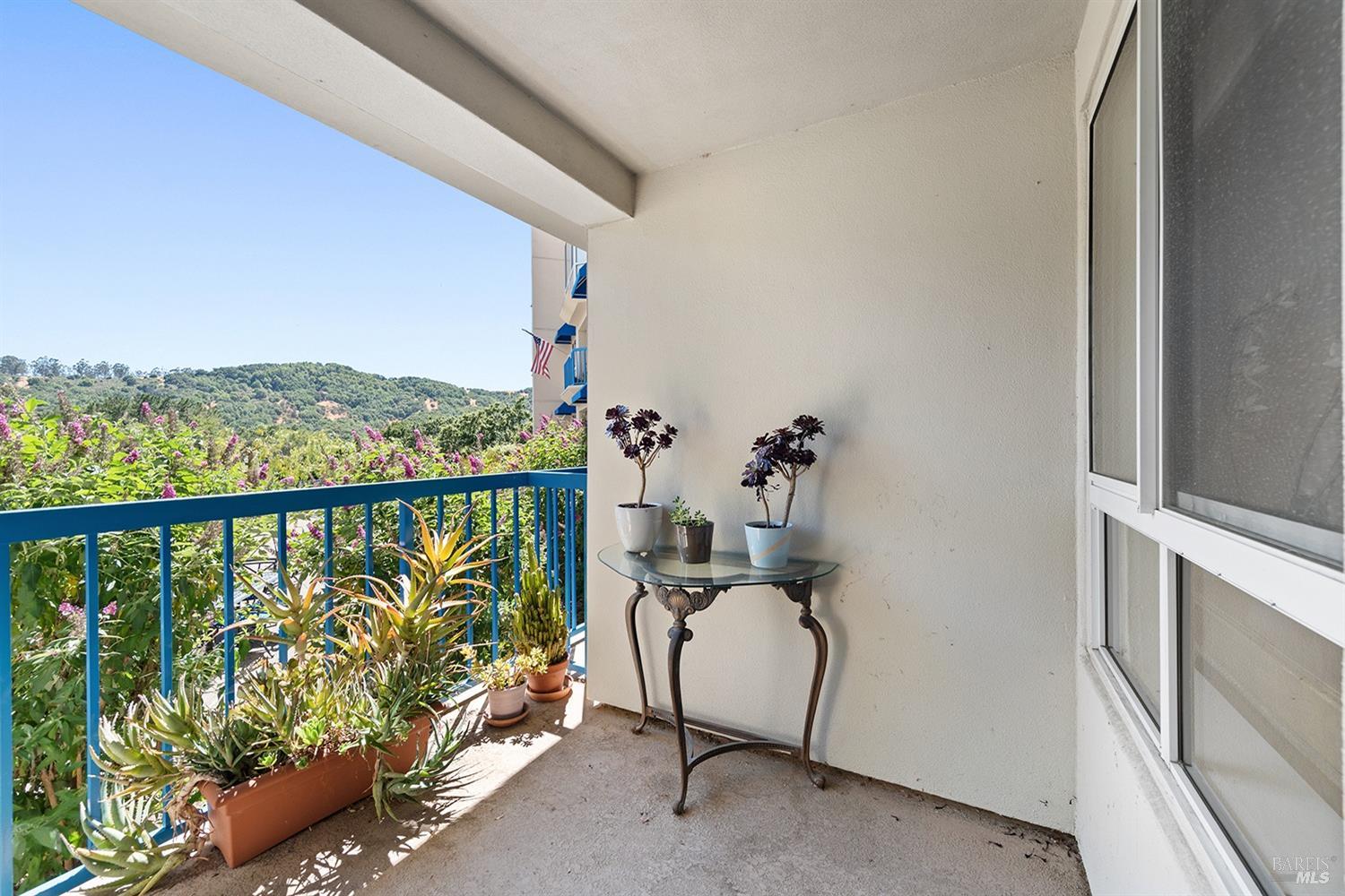 100 Thorndale Drive, Unit 116 San Rafael, CA 94903 - Photo 5 of 27 a view of a balcony with furniture