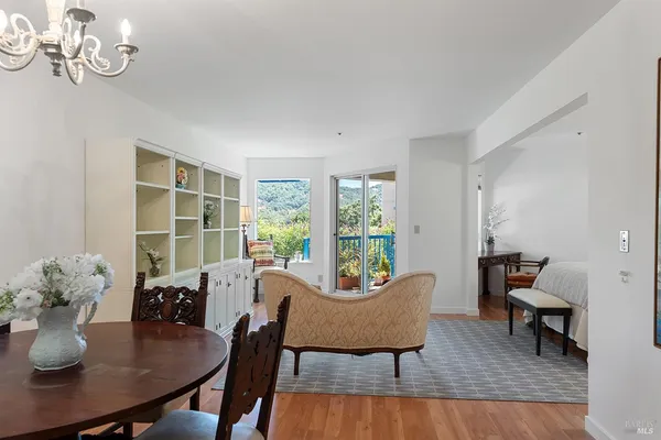 a view of a dining room with furniture window and outside view