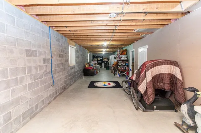 a view of parking garage with cars